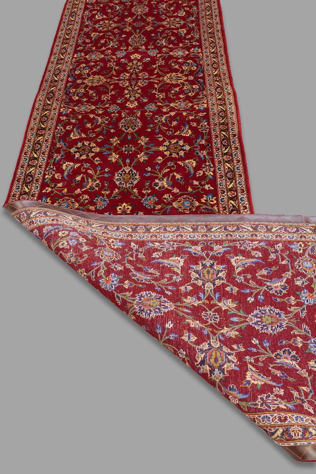 A runner from Kashan, around 500 x 93 cm.