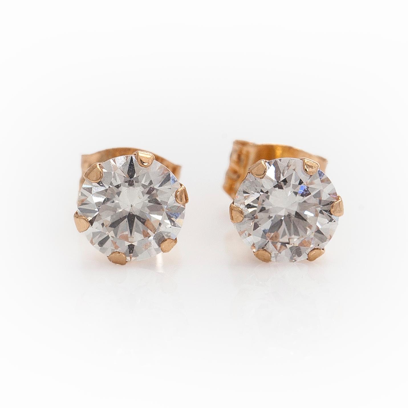 Earrings, brilliant cut diamonds, total 1.00 ct, 14K gold.