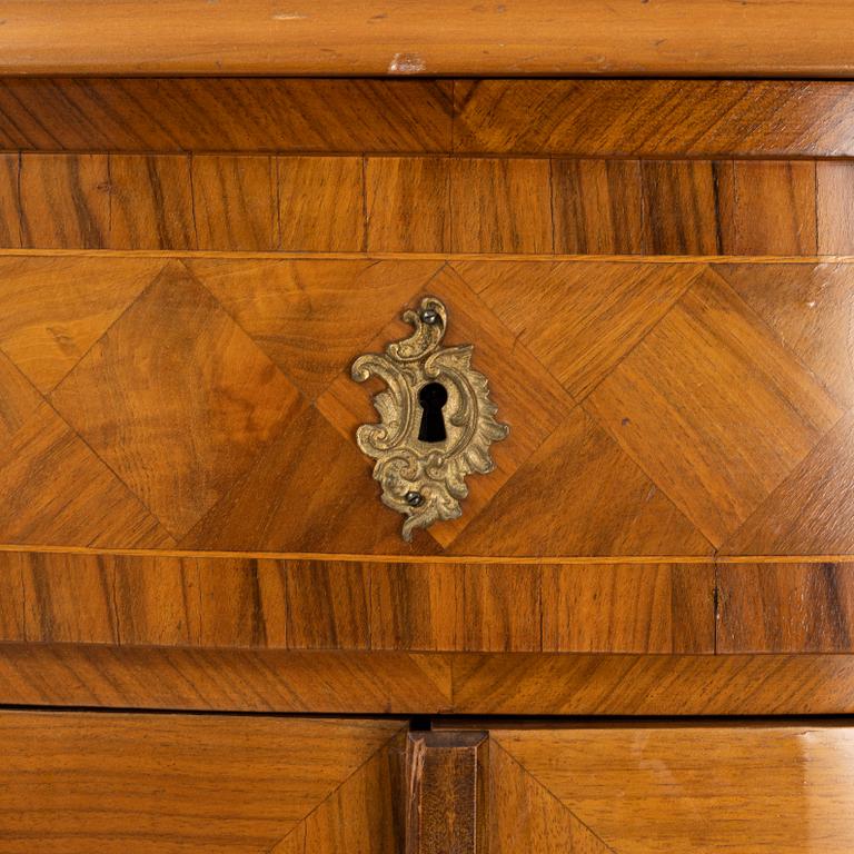 A walnut veneered Louis XV style cabinet, early 20th Century.