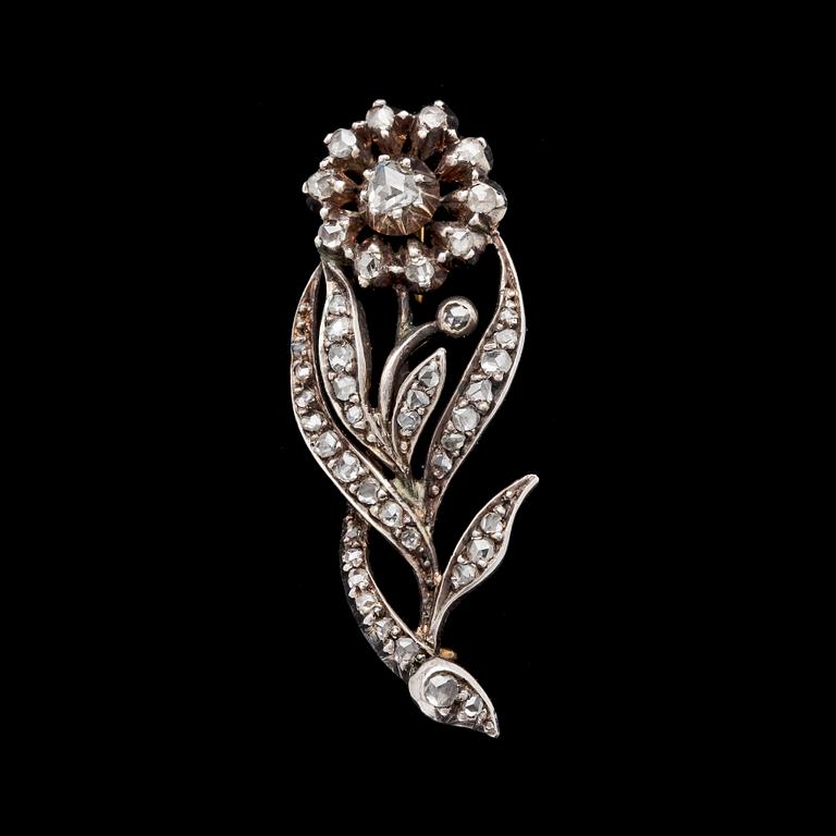 BROSCH, silver och guld med rosenslipade diamanter.