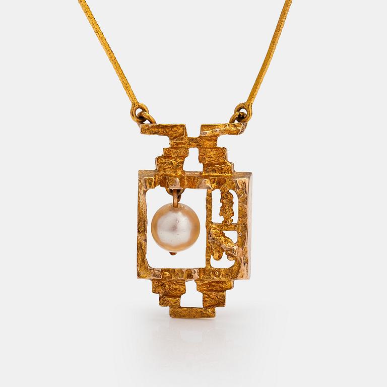 Björn Weckström, "Magic pearl", an 14K gold necklace with a cultured pearl. Lapponia 1972.