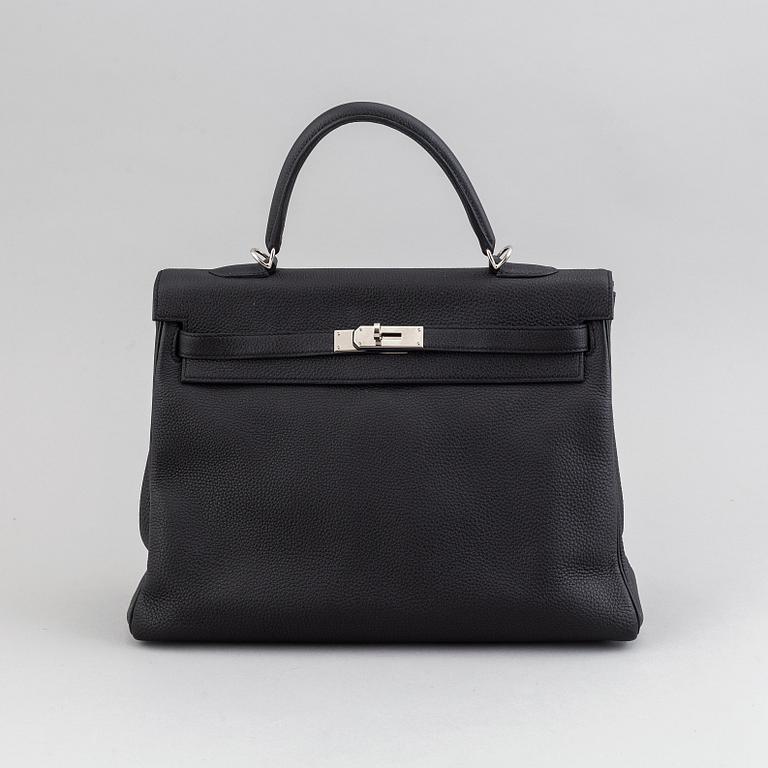 Hermès, a 'Kelly 35' black leather bag, 2017.