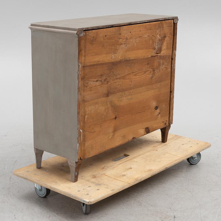 A painted chest of drawers, early 20th century.