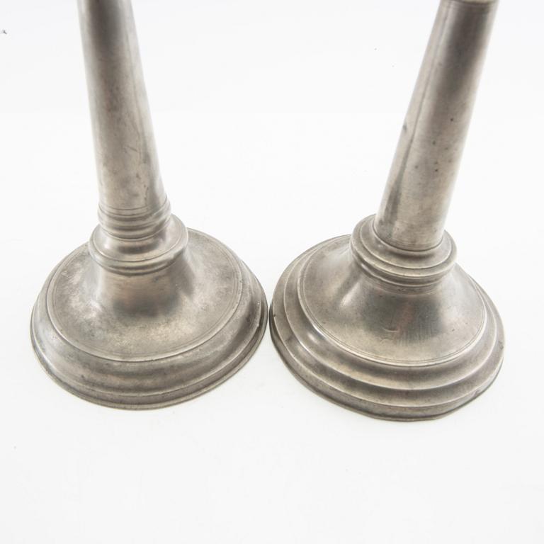 Candle holders, two pieces of pewter, 1850s.