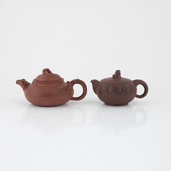 Two Yixing teapots, China, 20th century.