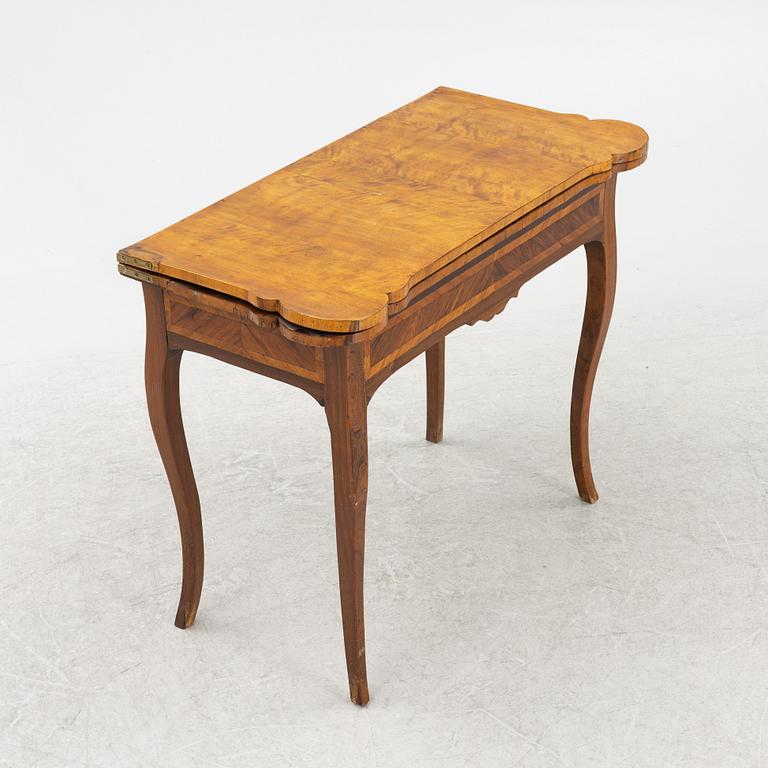 A rococo parquetry games table, later part of the 18th century.