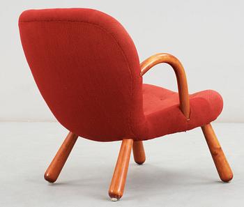 A 1940's-50's 'Clam chair' attributed to Philip Arctander for Möbelstil, Jönköping, Sweden.