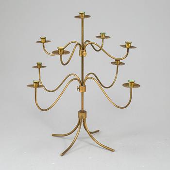 A BRASS CANDELABRUM, second half of the 20th century.