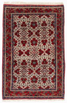 A rug, Ghom, circa 206 x 136 cm.