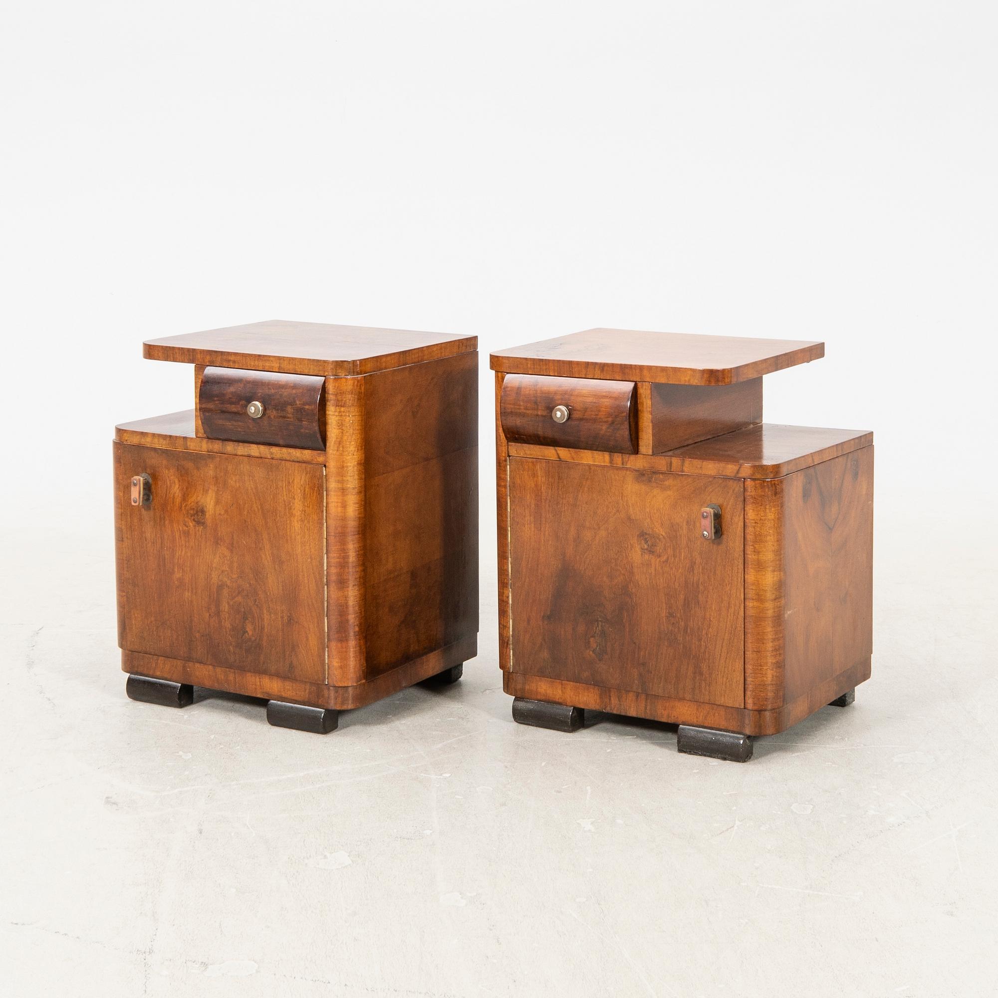 A pair of Art deco walnut bedside tables.