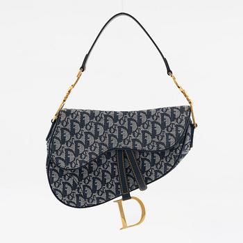 Christian Dior, a monogram canvas 'Saddle bag'.