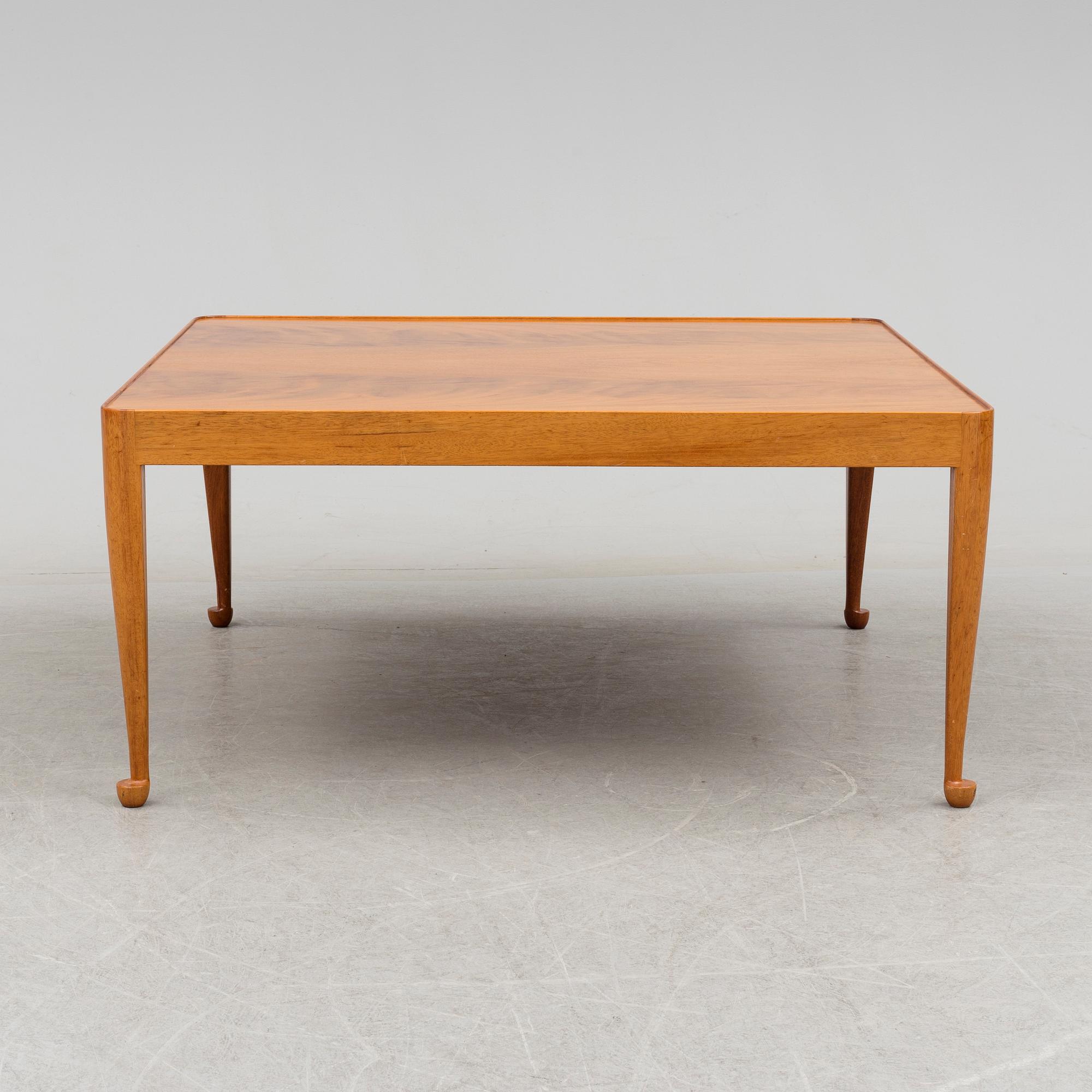 A second half of the 20th cnentury 'Diplomat' coffee table by Josef Frank for Firma Svenskt Tenn.