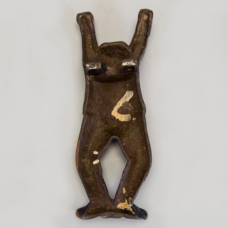 A cast iron boot jack by Bolinder, Stockholm, around 1900.