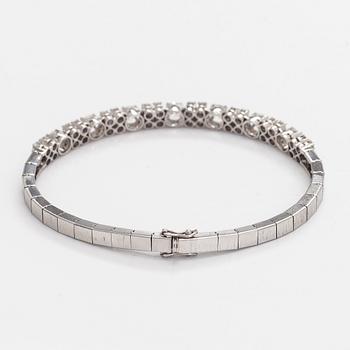 Armband, 14K vitguld med briljantslipade diamanter, Importstämplad A. Tillander 1975.