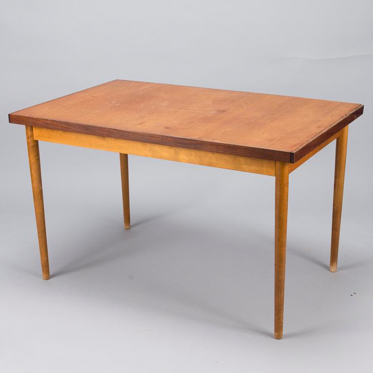 A set of four  chairs by Edsby Verken and a mid 20th century table.