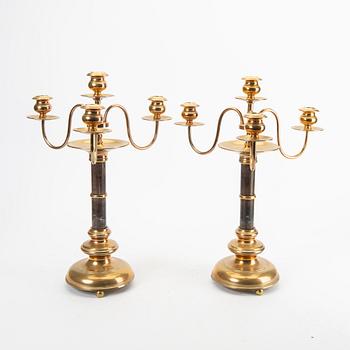 A pair of brass and wood candelabras early 1900s.