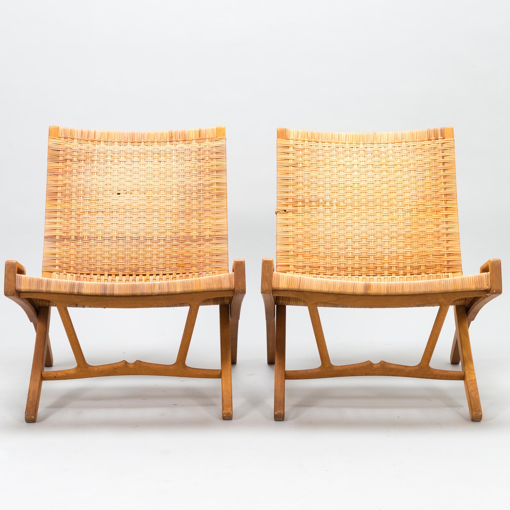 HANS J WEGNER, A pair of JH-512 folding chairs for Johannes Hansen, Denmark, early 1980s. Model designed in 1949.