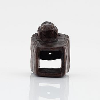 A Japanese wood netsuke of a frog, Masanao Yamada,
Edo period (1615-1868), 19th century.