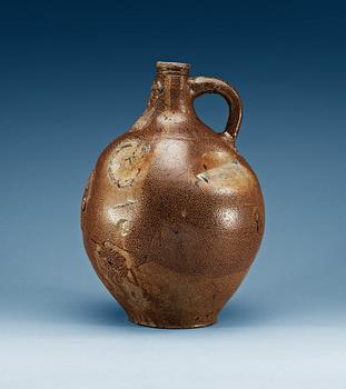 726. A large salt-glazed stoneware 'Bartman jug', 17th Century.