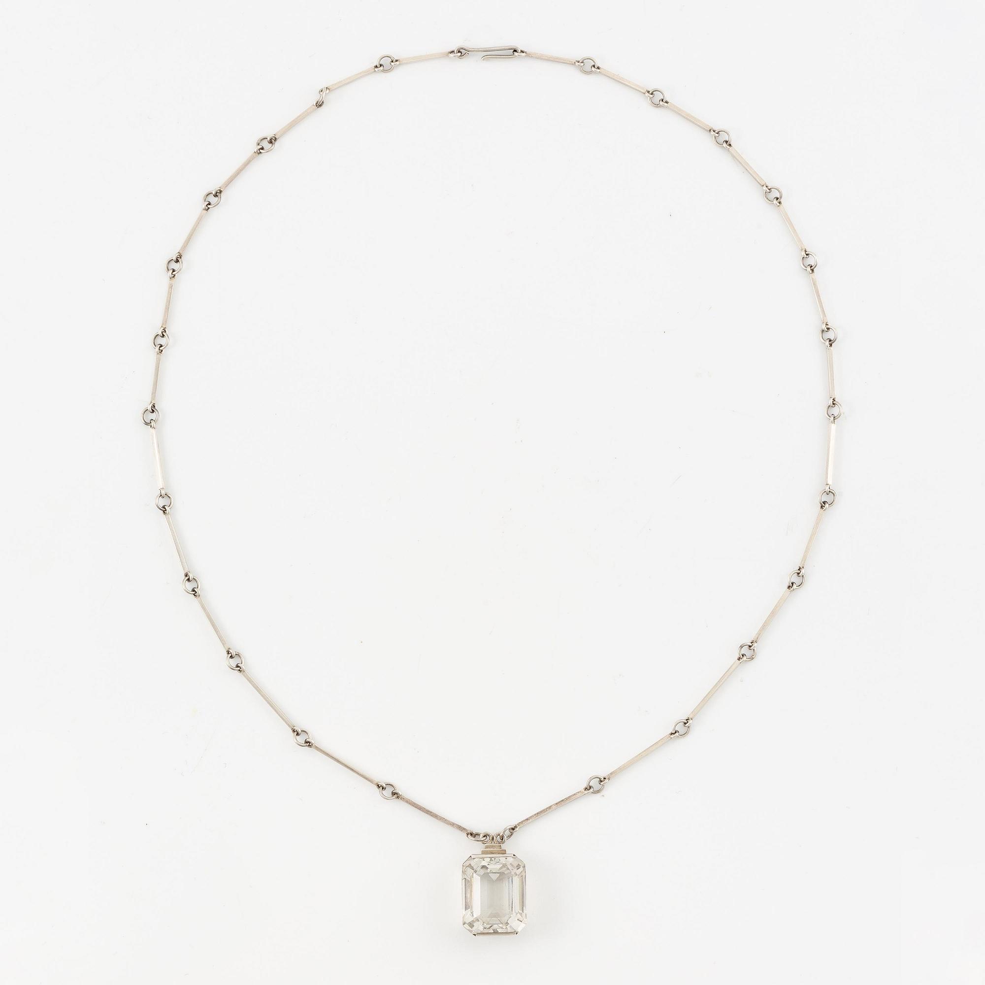 Wiwen Nilsson, a necklace, ring and pendant chain with pendant, silver with rock crystal, Lund 1947.