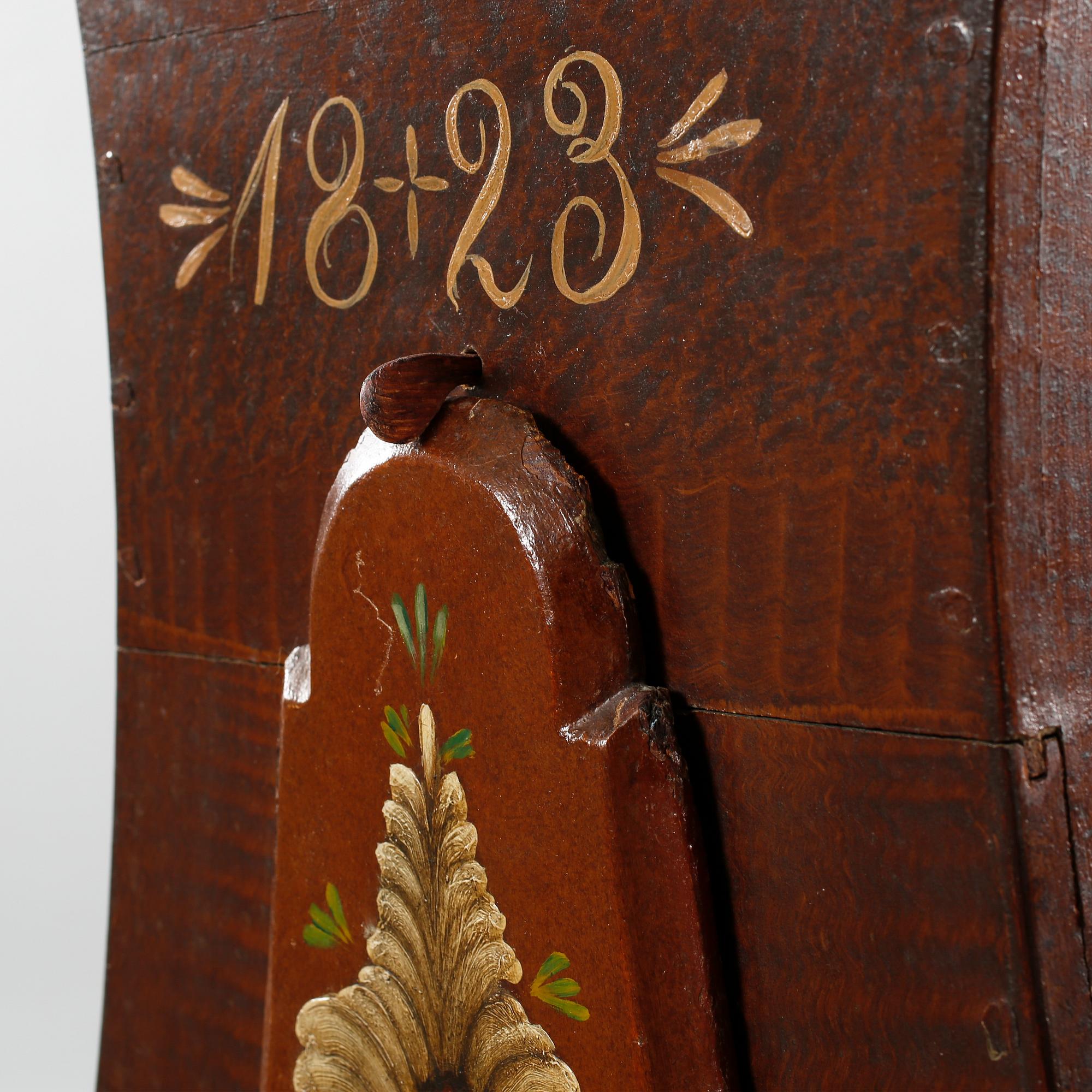 A grandfather clock dated 1823.