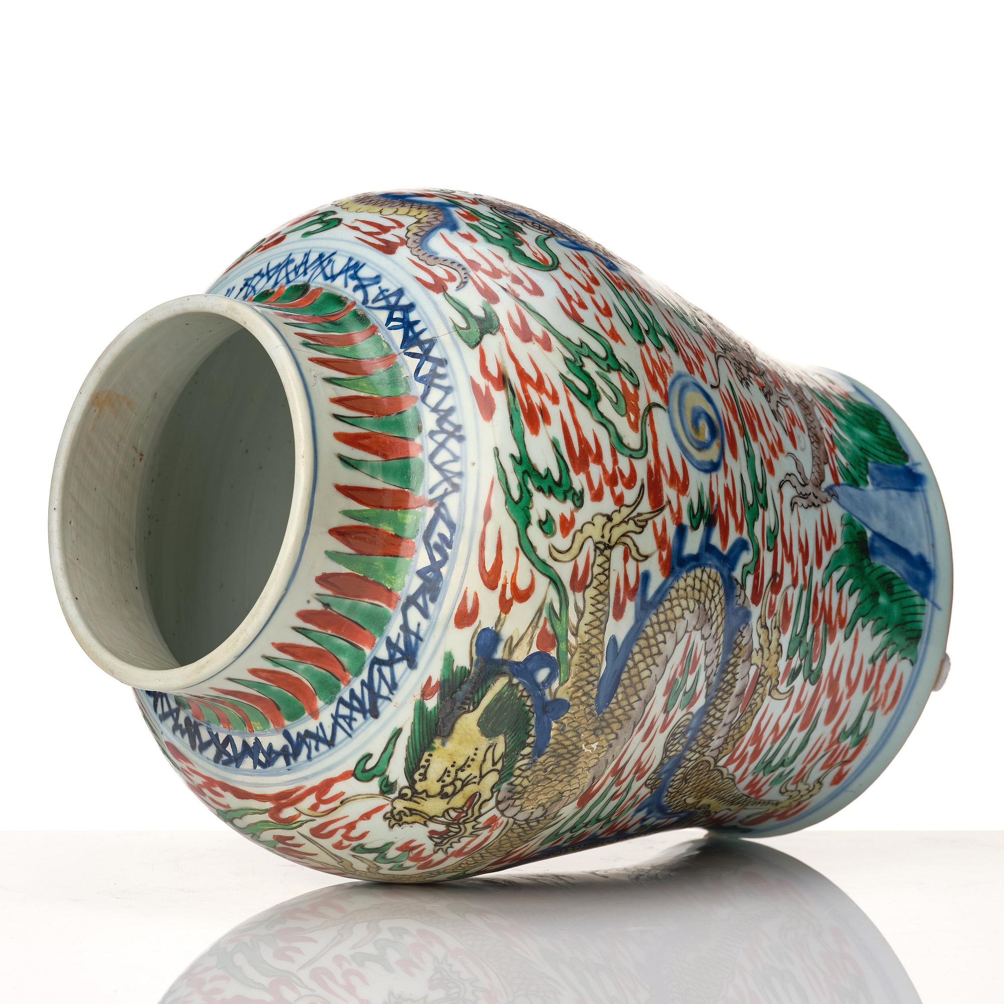 A matched pair of Transitional Wucai jars, 17th Century.