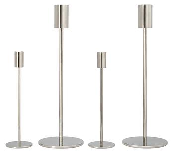 A set of four stainless steel candle sticks 'Noster', by Jonas Lindvall Skandiform.