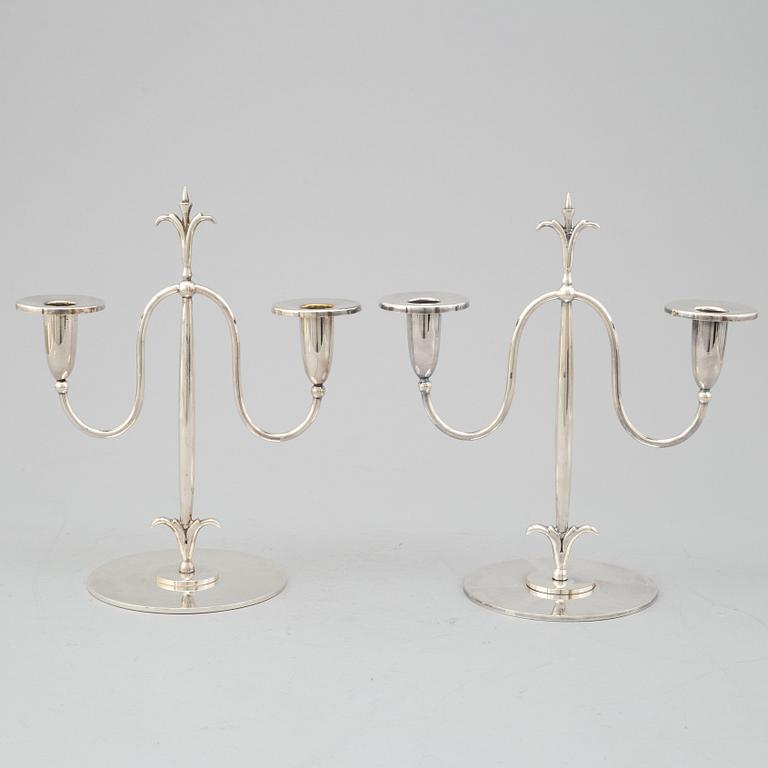 a pair of Elis Bergh silver plated candelabras, Swedish grace, CG Hallberg, Stockholm, 1920s.