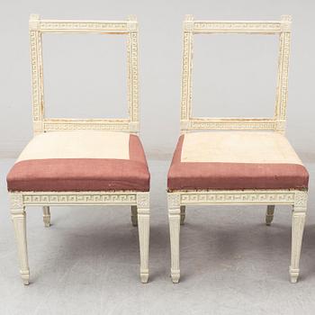 Four painted Gustavian chairs from around 1800.