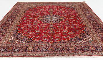 A Keshan carpet, approximately 408 x 287 cm.
