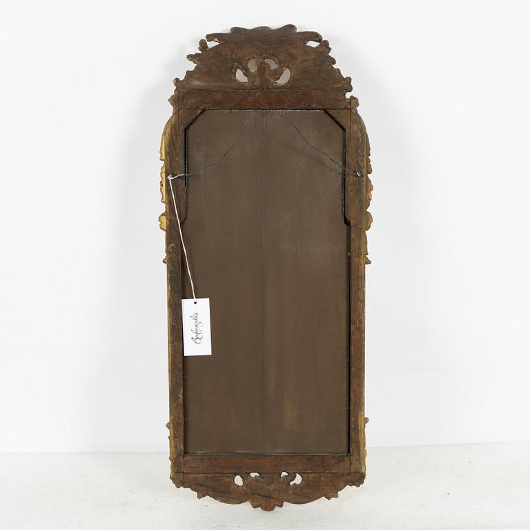 A Rococo style mirror, late 19th Century.