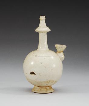 A white glazed ewer, presumably Tang dynasty.