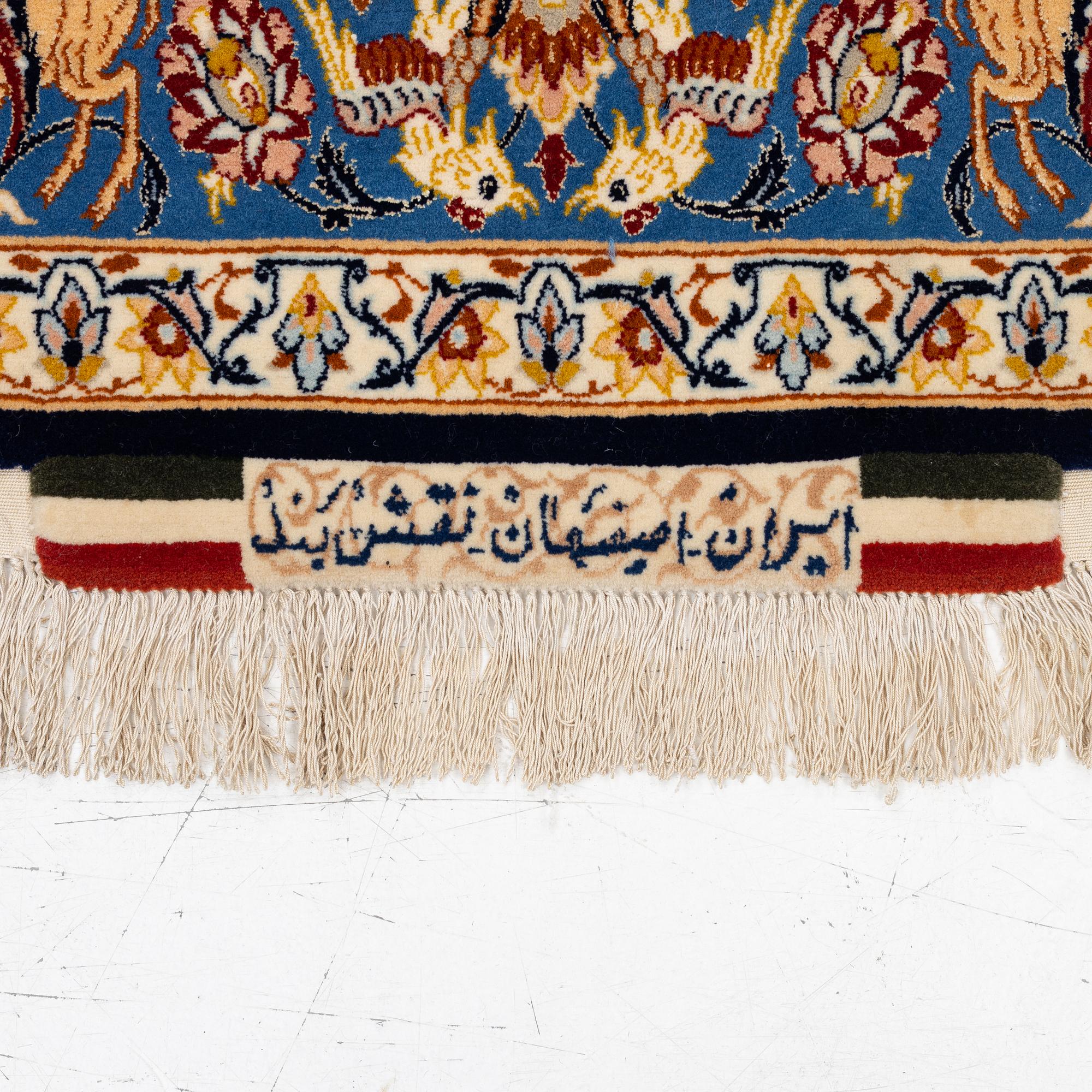 A semi-antique part silk Isfahan, signed, c. 176 x 107 cm.