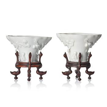 956. Two blanc de chine rhinoceros libation cups, Qing dynasty, Kangxi (1662-1722).