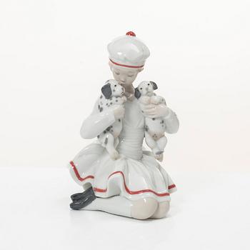 Lladró, three figurines,"Girl with French bulldog", "Girl with Dalmatians" and "Petals in the pond", Spain.