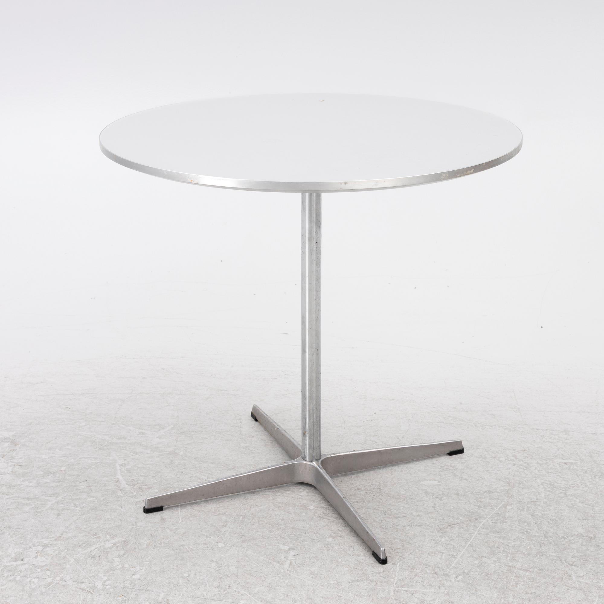 Arne Jacobsen, A coffee table, by Fritz Hansen, dated 2000.