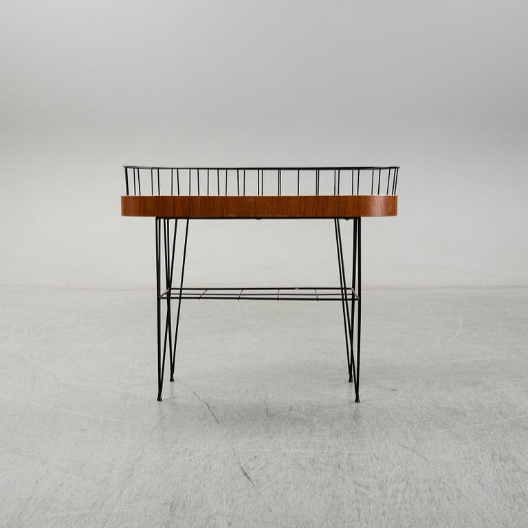 A 1950-60s plant stand.