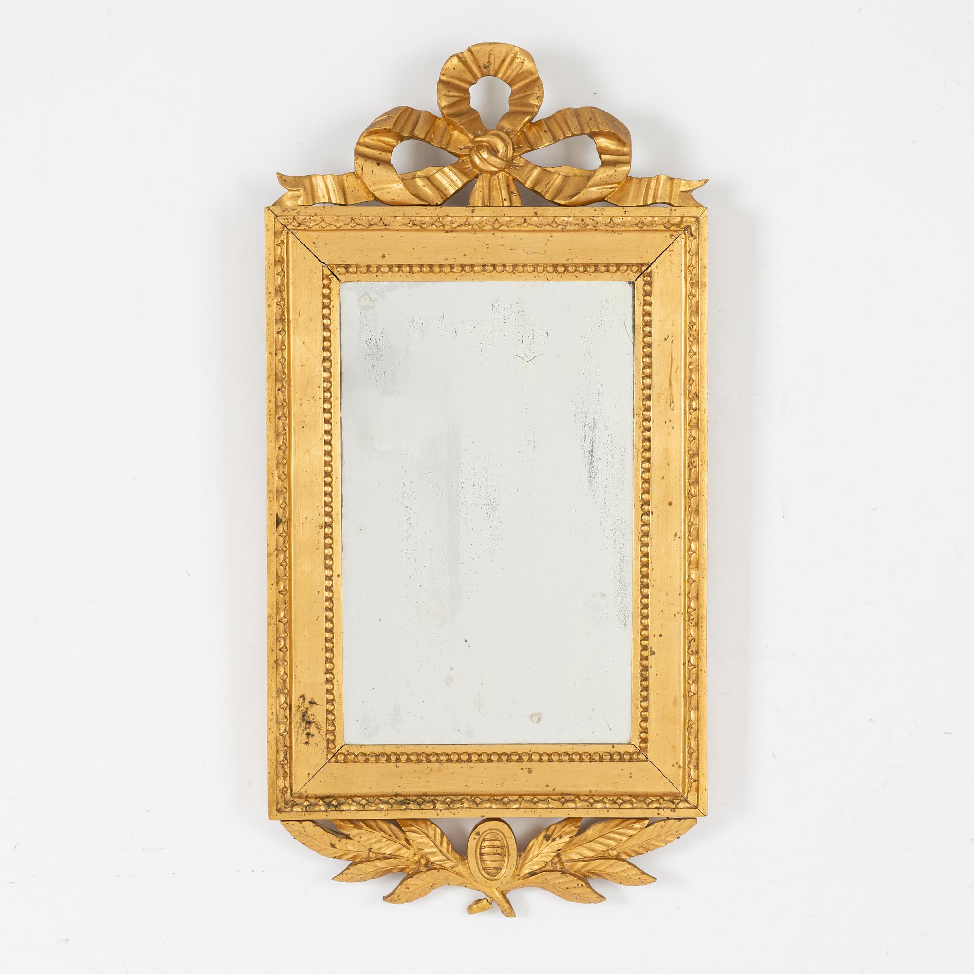 A Gustavian style mirror, first half of the 20th Century.