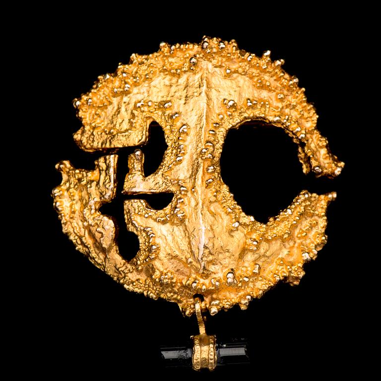 A BJÖRN WECKSTRÖM BROOCH, "Sun of the Incas", 14K gold, tourmaline. Lapponia 1972.