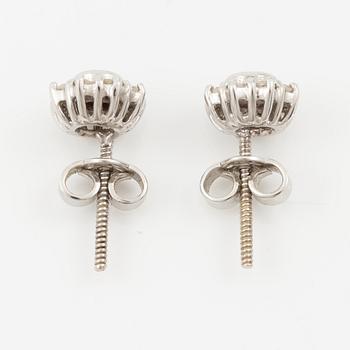 Pendant with gold chain, 
Pendant with white gold chain, 
Earrings a pair, rubies with brilliant-cut diamonds.
