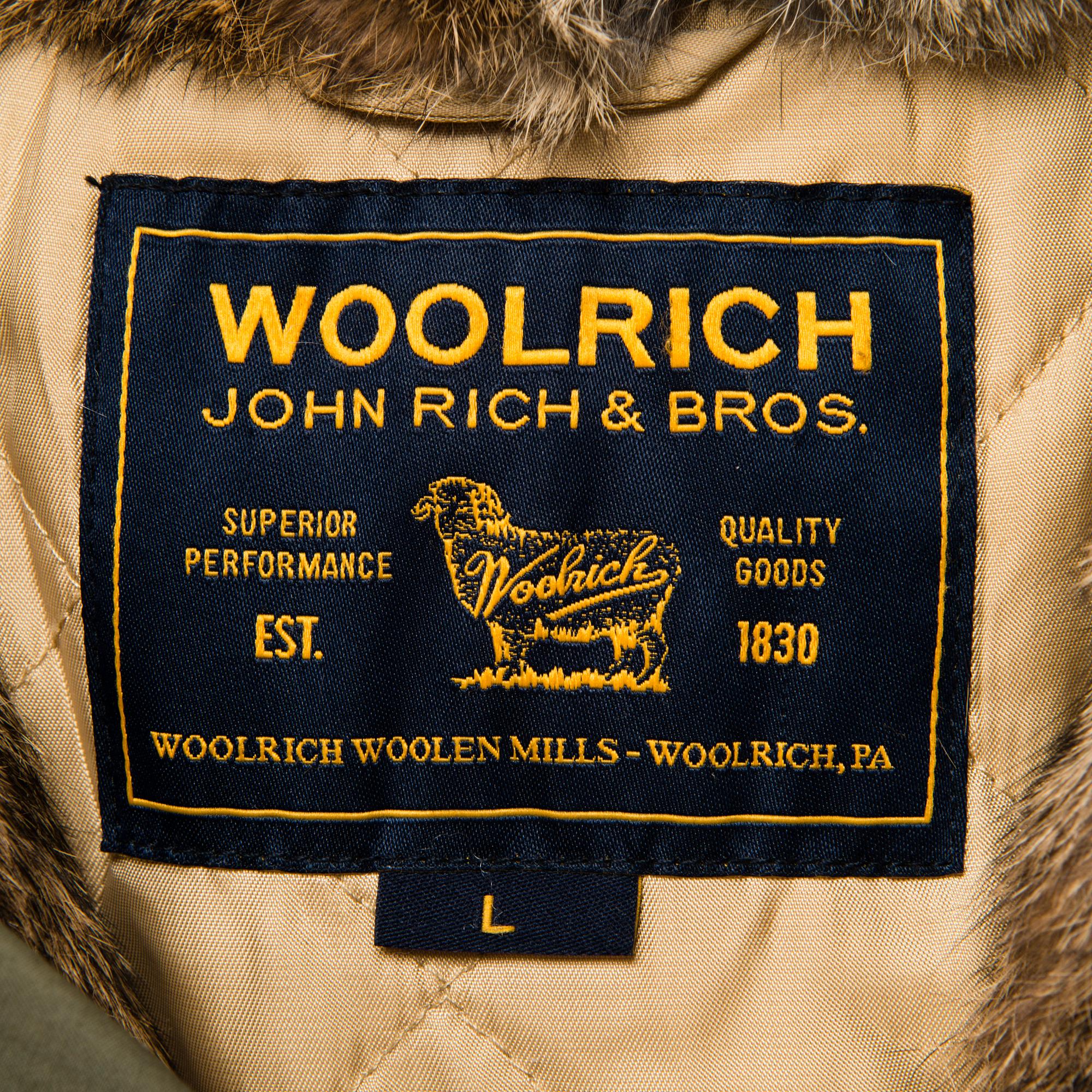 Ladies Woolrich Military Parka in size L.
