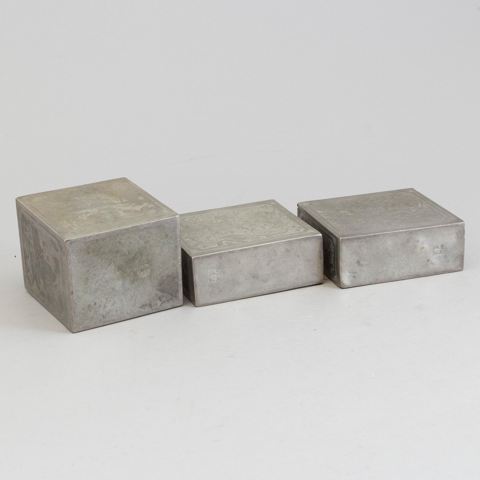 Three Chinese teacaddies in tin, Qing dynasty, 19th century.