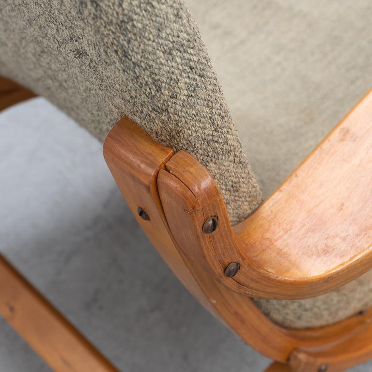 A pair of birch tree easy chairs. Mid 20th century.