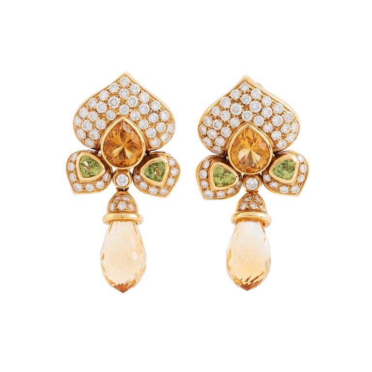 A pair of 18K gold earrings with briolette- and faceted-cut citrine and peridot.