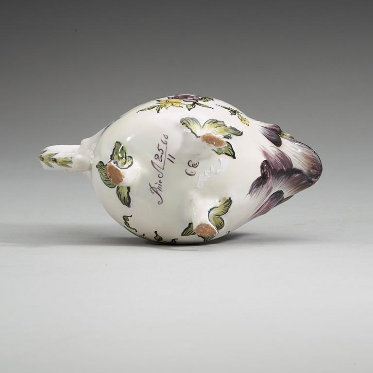 A Swedish faience sauce boat, Rörstrand, dated 25/11 (17)66.