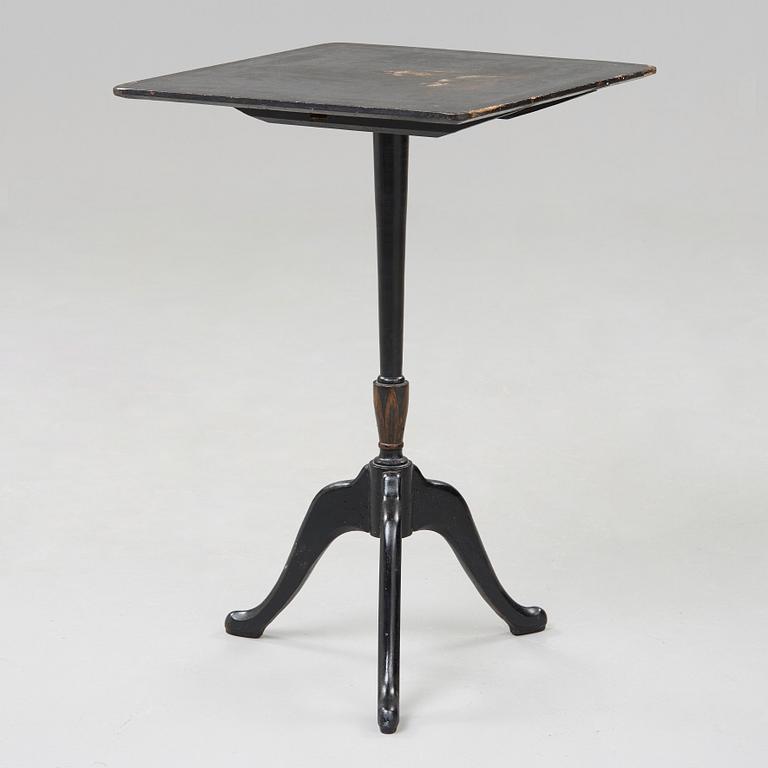 A Swedish tilt top table, from Nils Asplind's workshop signed and dated 1814.