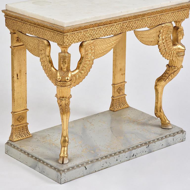 A late Gustavian giltwood console in the manner of J. Frisk, Stockholm, early 19th century.
