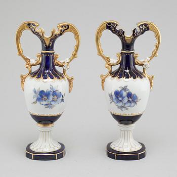 A pair of porcelian vases by Royal Dux, from the latter half of the 20th century.