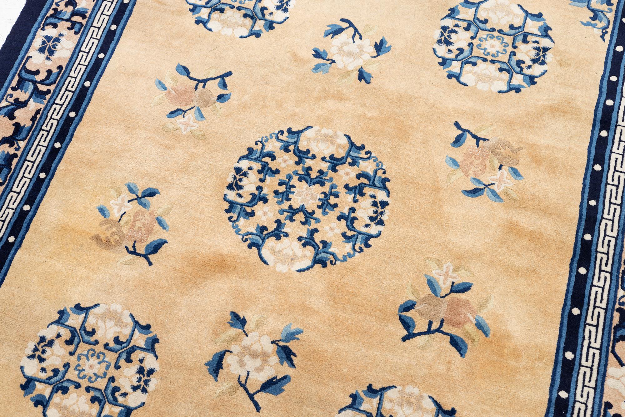 A semi-antique chinese rug, c. 195 x 132 cm .