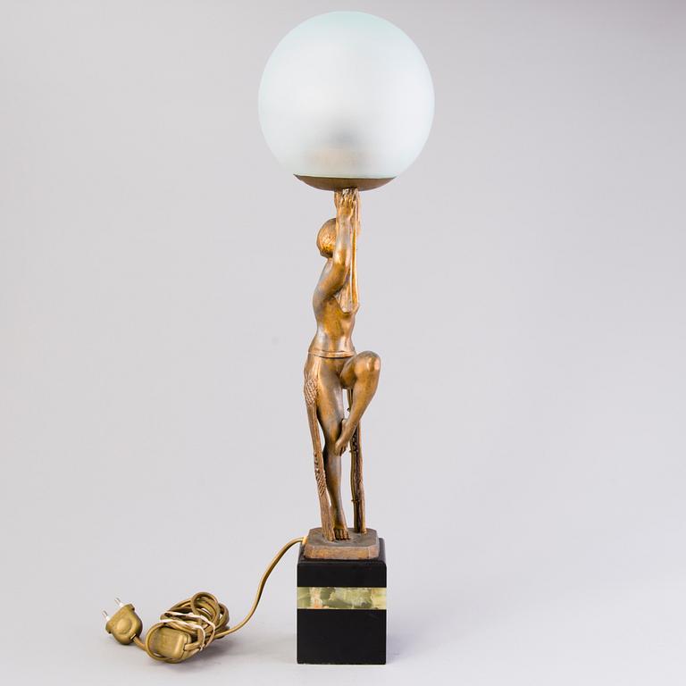 An Art Déco table lamp, marked Limousin, Paris.